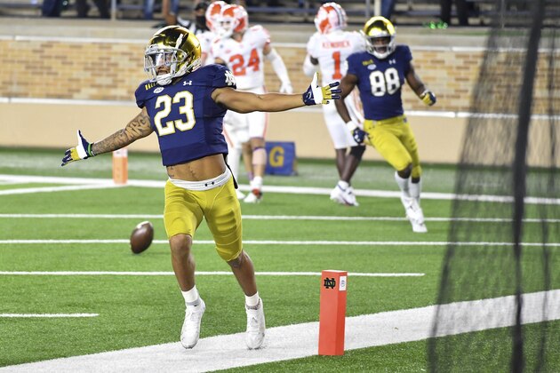 Notre Dame  running back Kyren Williams (23) celebrates after his first-quarter touchdown against Clemson during an NCAA college football game Saturday, Nov. 7, 2020, in South Bend, Ind. (Matt Cashore/Pool Photo via AP)
