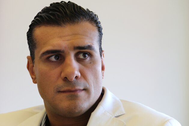 In this April 2, 2013 photo, Mexican Lucha Libre wrestler Alberto del Rio poses for a portrait in New York.  Del Rio is a Mexican wrestler who confronted Jack Swagger, who played the role of an American who does not like immigrants living illegally in the US, on Sunday in a fight at the WWE Wrestlemania 29 wrestling event in New Jersey, the biggest WWE event of the year.  The immigration storyline helps WWE, or Lucha Libre USA, attract Latino audiences to their fights. (AP Photo/Peter Morgan)