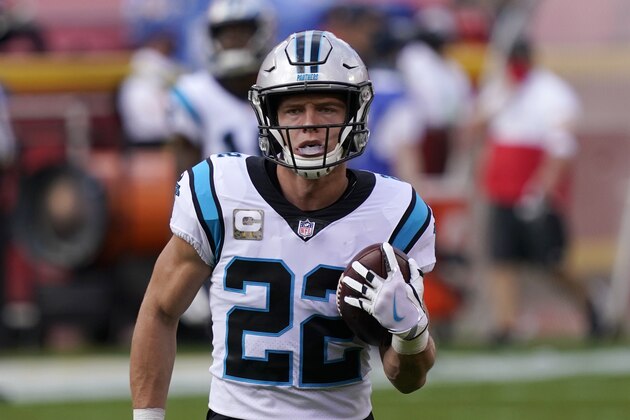 Carolina Panthers running back Christian McCaffrey (22) warms up before an NFL football game against the Kansas City Chiefs in Kansas City, Mo., Sunday, Nov. 8, 2020. (AP Photo/Jeff Roberson)