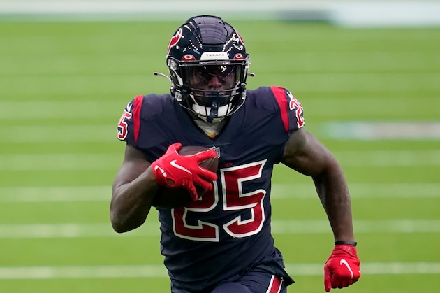 Houston Texans running back Duke Johnson runs with the ball during the second half of an NFL football game against the Green Bay Packers Sunday, Oct. 25, 2020, in Houston. (AP Photo/Sam Craft)