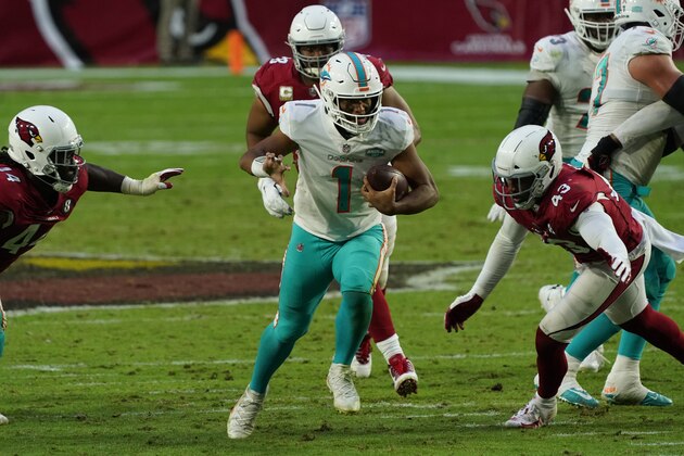 Miami Dolphins quarterback Tua Tagovailoa (1) runs against the Arizona Cardinals during the second half of an NFL football game, Sunday, Nov. 8, 2020, in Glendale, Ariz. (AP Photo/Rick Scuteri)