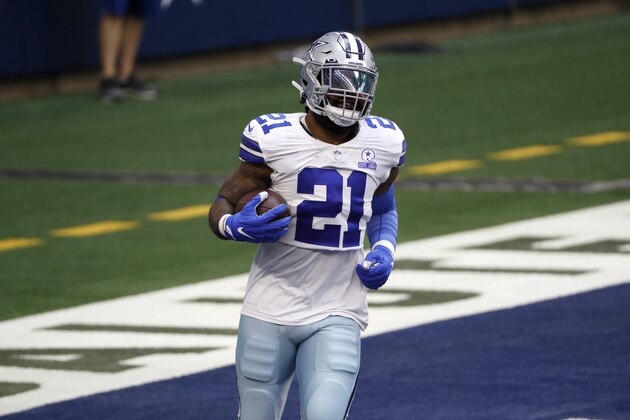 Dallas Cowboys running back Ezekiel Elliott participates in warmups before an NFL football game against the Pittsburgh Steelers in Arlington, Texas, Sunday, Nov. 8, 2020. (AP Photo/Roger Steinman)