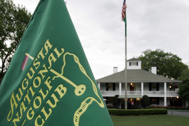 FILE - In this April 4, 2007, file photo, cloudy skies appear above the clubhouse at the Augusta National Golf Club in Augusta, Ga. The Par 3 Contest is out at the spectator-free Masters in November. ESPN's “College GameDay” is in. Augusta National announced Tuesday, Oct. 27, 2020, more changes to a Masters tournament that will be unlike any of the previous 83. The most unusual of all is ESPN's popular college football pregame show taking place on a stage that overlooks Ike's Pond and the ninth green of the Par 3 course. (AP Photo/David J. Phillip, File)