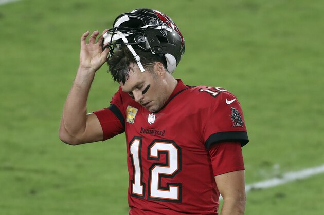 Tampa Bay Buccaneers quarterback Tom Brady (12) reacts as he leaves the field after throwing an interception against the New Orleans Saints during the second half of an NFL football game Sunday, Nov. 8, 2020, in Tampa, Fla. (AP Photo/Mark LoMoglio)