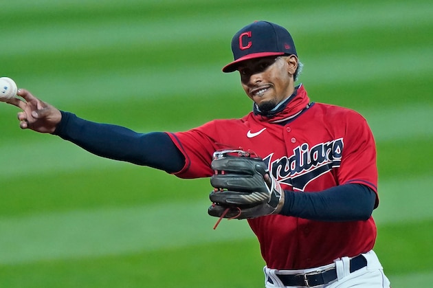 Cleveland Indians' Francisco Lindor throws out Kansas City Royals' Alex Gordon at first base in the sixth inning of a baseball game, Thursday, Sept. 10, 2020, in Cleveland. (AP Photo/Tony Dejak)