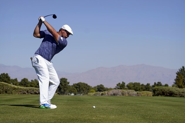 FILE - In this Oct. 11, 2020, file photo, Bryson DeChambeau hits off the 10th tee during the final round of Shriners Hospitals for Children Open golf tournament in Las Vegas. DeChambeau's bulk and power have made him the talk of golf going into the Masters. (AP Photo/John Locher, File)