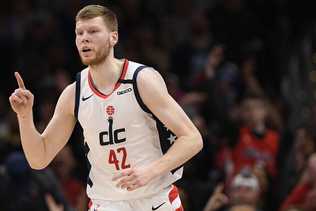 Washington Wizards forward Davis Bertans (42) gestures during the first half of an NBA basketball game against the Memphis Grizzlies, Sunday, Feb. 9, 2020, in Washington. (AP Photo/Nick Wass)