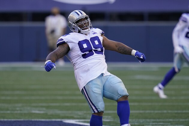 Dallas Cowboys defensive tackle Antwaun Woods reacts against the Seattle Seahawks during the second half of an NFL football game, Sunday, Sept. 27, 2020, in Seattle. (AP Photo/Elaine Thompson)