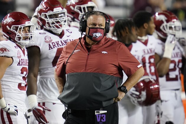 Arkansas head coach Sam Pittman looks on after a call during the first half of an NCAA college football game against Texas A&M on Saturday, Oct. 31, 2020, in College Station, Texas. (AP Photo/Sam Craft)