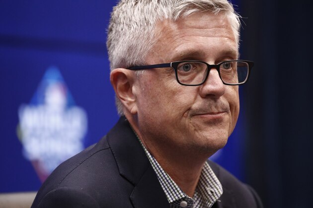 FILE - In this Oct. 24, 2019, file photo, Houston Astros general manager Jeff Luhnow speaks at a baseball World Series news conference in Washington. Houston  manager AJ Hinch and general manager Jeff Luhnow were suspended for the entire season Monday, Jan. 13, 2020,  and the team was fined $5 million for sign-stealing by the team in 2017 and 2018 season. Commissioner Rob Manfred announced the discipline and strongly hinted that current Boston manager Alex Cora — the Astros bench coach in 2017 — will face punishment later. Manfred said Cora developed the sign-stealing system used by the Astros. (AP Photo/Patrick Semansky, File)