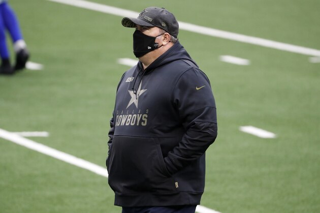 Dallas Cowboys head coach Mike McCarthy watches warmups before an NFL football game against the Dallas Cowboys in Arlington, Texas, Sunday, Nov. 8, 2020. (AP Photo/Roger Steinman)