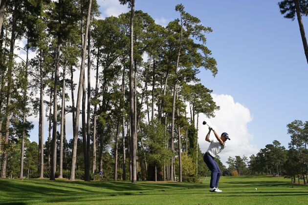 Justin Thomas prepares to tee off on the 17th hole during a practice round for the Masters golf tournament Monday, Nov. 9, 2020, in Augusta, Ga. (AP Photo/David J. Phillip)