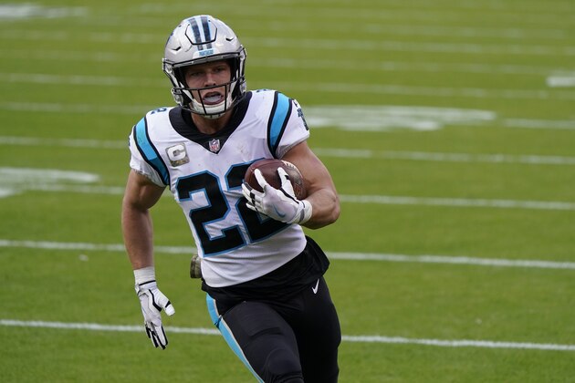 Carolina Panthers running back Christian McCaffrey (22) scores a touchdown against the Kansas City Chiefs during the first half of an NFL football game in Kansas City, Mo., Sunday, Nov. 8, 2020. (AP Photo/Jeff Roberson)