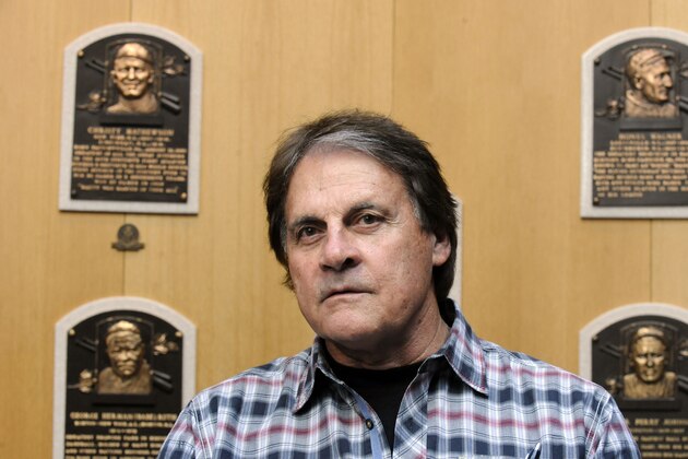 Baseball Hall of Fame inductee Tony La Russa speaks with reporters at the National Baseball Hall of Fame and Museum in Cooperstown, N.Y., Thursday, April 10, 2014. La Russa is scheduled to be inducted into the hall this summer. (AP Photo/Tim Roske)