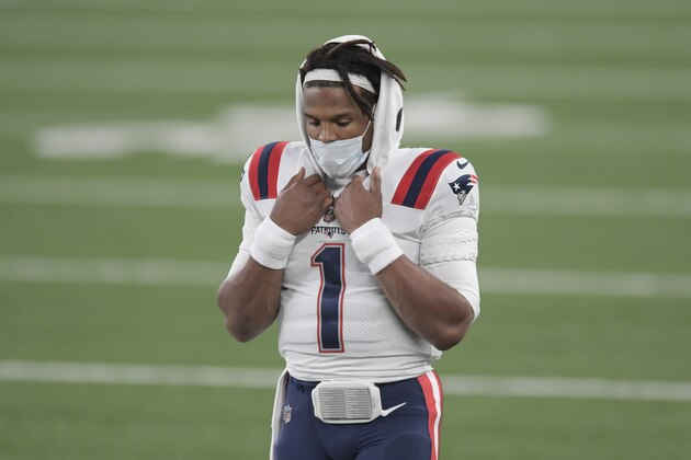 New England Patriots quarterback Cam Newton walks on the field during the first half of an NFL football game against the New York Jets, Monday, Nov. 9, 2020, in East Rutherford, N.J. (AP Photo/Bill Kostroun)