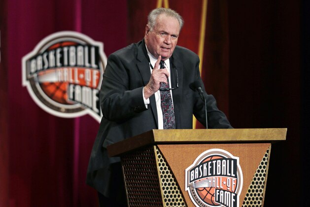 Basketball Hall of Fame inductee Tommy Heinsohn gestures during the enshrinement ceremony for the Class of 2015 of the Naismith Memorial Basketball Hall of Fame in Springfield, Mass., Friday, Sept. 11, 2015. Heinsohn initially entered the Hall of Fame as a player in 1986, before entering as a coach this year. (AP Photo/Charles Krupa)