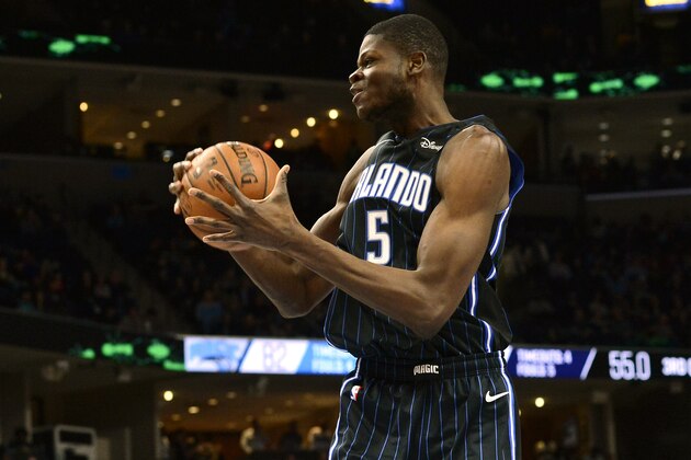 Orlando Magic center Mo Bamba (5) grabs a rebound in the second half of an NBA basketball game against the Memphis Grizzlies Tuesday, March 10, 2020, in Memphis, Tenn. (AP Photo/Brandon Dill)