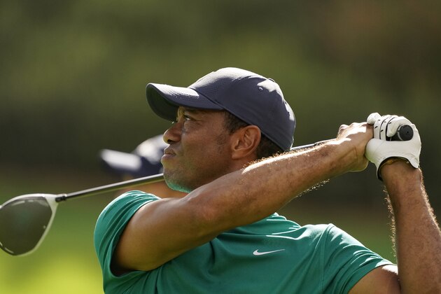 Tiger Woods tees off on the 17th hole during a practice round for the Masters golf tournament Monday, Nov. 9, 2020, in Augusta, Ga. (AP Photo/Charlie Riedel)