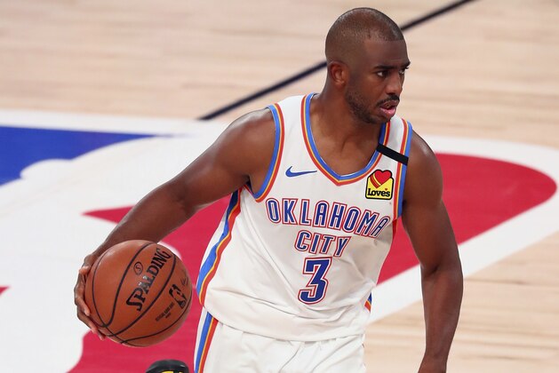 Oklahoma City Thunder guard Chris Paul (3) brings the ball upcourt against the Houston Rockets during the second half of Game 4 of an NBA basketball first-round playoff series, Monday, Aug. 24, 2020, in Lake Buena Vista, Fla. (Kim Klement/Pool Photo via AP)
