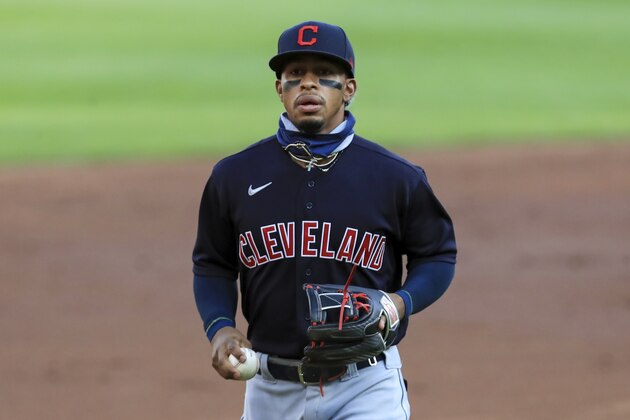 Cleveland Indians' Francisco Lindor (12) plays the field during a baseball game against the Cincinnati Reds in Cincinnati, Tuesday, Aug. 4, 2020. The Indians won 4-2. (AP Photo/Aaron Doster)