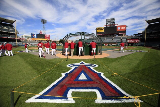 The Los Angeles Angels logo is seen  behind home plate during the Angels baseball practice in Anaheim, Calif., Wednesday, Oct. 21, 2009. The Angels play the New York Yankees in Game 5 of the American League Championship Series on Thursday. (AP Photo/Jae C. Hong)