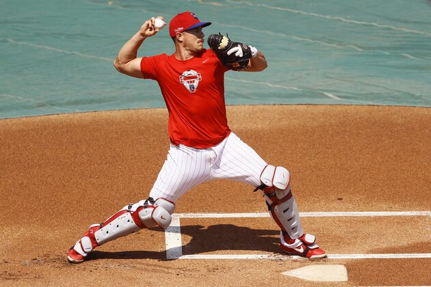 Philadelphia Phillies' J.T. Realmuto throws to second base during baseball practice at Citizens Bank Park, Monday, July 6, 2020, in Philadelphia. (AP Photo/Matt Slocum)