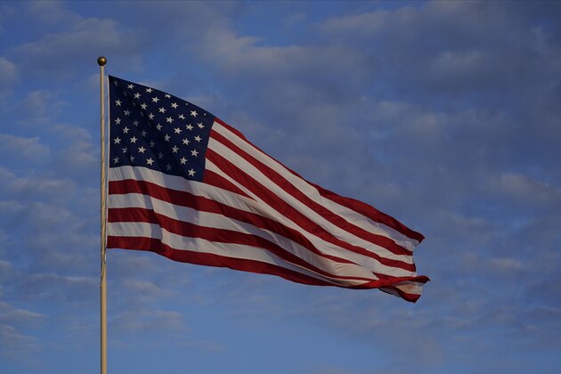 The American flag flies during the second half of an NCAA college football game between Indiana and Penn State, Saturday, Oct. 24, 2020, in Bloomington, Ind. Indiana won 36-35 in overtime. (AP Photo/Darron Cummings)