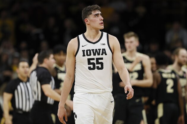 Iowa center Luka Garza walks on the court during an NCAA college basketball game against Purdue, Tuesday, March 3, 2020, in Iowa City, Iowa. (AP Photo/Charlie Neibergall)
