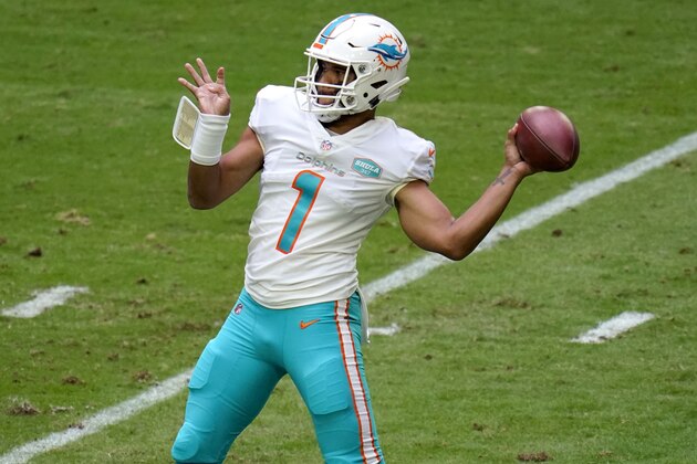 Miami Dolphins quarterback Tua Tagovailoa (1) throws against the Arizona Cardinals during the first half of an NFL football game, Sunday, Nov. 8, 2020, in Glendale, Ariz. (AP Photo/Ross D. Franklin)