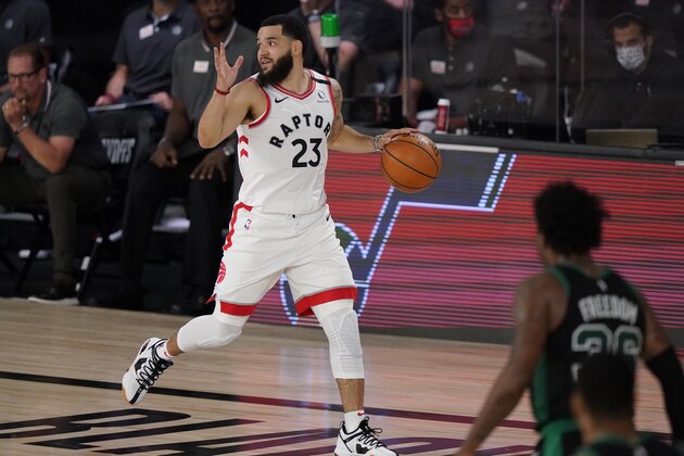 Toronto Raptors' Fred VanVleet (23) dribbles in front of Boston Celtics' Marcus Smart (36) in the first half of an NBA conference semifinal playoff basketball game Tuesday, Sept. 1, 2020, in Lake Buena Vista, Fla. (AP Photo/Mark J. Terrill)