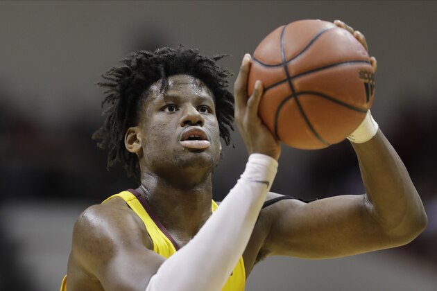 Minnesota's Daniel Oturu (25) shoots during the second half of an NCAA college basketball game against Indiana, Wednesday, March 4, 2020, in Bloomington, Ind. Indiana defeated Minnesota 72-67. (AP Photo/Darron Cummings)