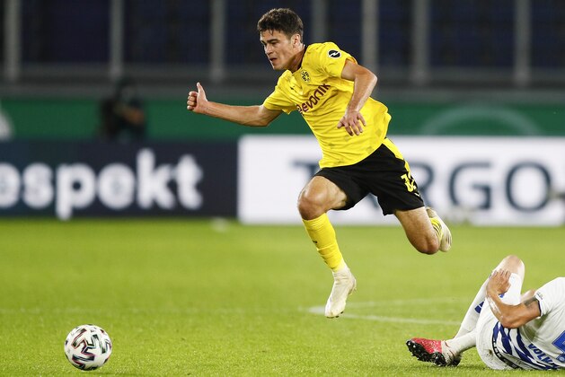 FILE  - In this Sept. 14, 2020, file photo, Dortmund's Giovanni Reyna plays during a first round German Soccer Cup match against MSV Duisburg in Duisburg, Germany. Gio Reyna, a son of former U.S. captain Claudio Reyna, got his first call-up to the U.S. national soccer team. The Borussia Dortmund midfielder is part of a 24-man roster for exhibitions at Wales on Nov. 12 and against Panama four days later in Austria. (AP Photo/Martin Meissner, File)