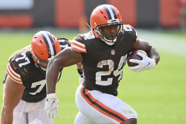 Cleveland Browns running back Nick Chubb rushes for a 20-yard touchdown during the second half of an NFL football game against the Washington Football Team, Sunday, Sept. 27, 2020, in Cleveland. (AP Photo/David Richard)
