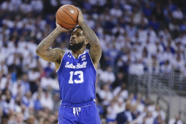 Seton Hall's Myles Powell (13) shoots during the first half of an NCAA college basketball game against Creighton in Omaha, Neb., Saturday, March 7, 2020. (AP Photo/Nati Harnik)