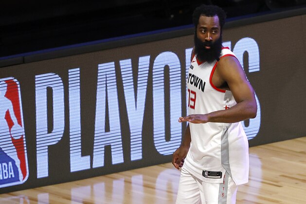 Houston Rockets' James Harden leaves the court following his team's loss during overtime against the Oklahoma City Thunder in Game 3 of an NBA basketball first-round playoff series, Saturday, Aug. 22, 2020, in Lake Buena Vista, Fla. (Mike Ehrmann/Pool Photo via AP)