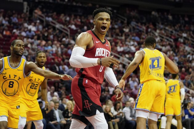 Houston Rockets' Russell Westbrook (0) looks for a foul call after making a basket against the Golden State Warriors during the second half of an NBA basketball game Wednesday, Nov. 6, 2019, in Houston. The Rockets won 129-112. (AP Photo/David J. Phillip)