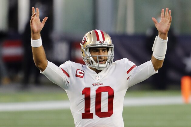 San Francisco 49ers quarterback Jimmy Garoppolo celebrates a touchdown during an NFL football game against the New England Patriots at Gillette Stadium, Sunday, Oct. 25, 2020 in Foxborough, Mass. (Winslow Townson/AP Images for Panini)