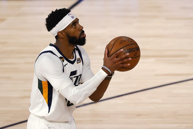 Utah Jazz's Mike Conley shoots during the third quarter against the Denver Nuggets in Game 5 of an NBA basketball first-round playoff series, Tuesday, Aug. 25, 2020, in Lake Buena Vista, Fla. (Mike Ehrmann/Pool Photo via AP)