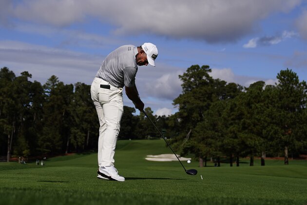 Lee Westwood, of England, tees off on the eighth hole during the first round of the Masters golf tournament Thursday, Nov. 12, 2020, in Augusta, Ga. (AP Photo/Matt Slocum)