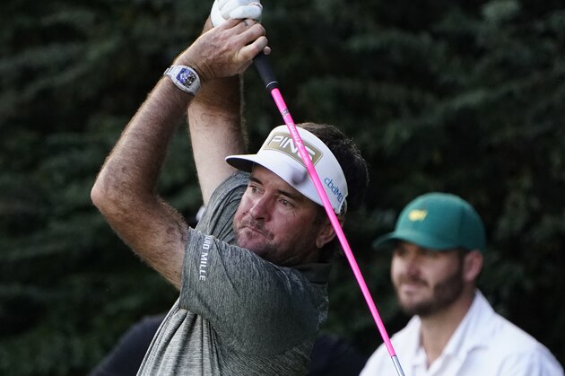 Bubba Watson watches his tee shot on the 14th hole during the first round of the Masters golf tournament Thursday, Nov. 12, 2020, in Augusta, Ga. (AP Photo/Chris Carlson)