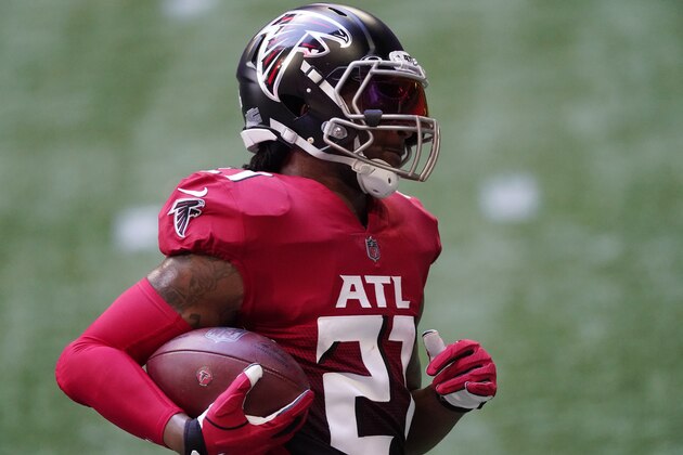 Atlanta Falcons running back Todd Gurley (21) runs against the Detroit Lions during the first half of an NFL football game, Sunday, Oct. 25, 2020, in Atlanta. (AP Photo/John Bazemore)