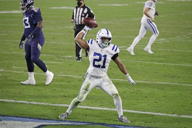 Indianapolis Colts running back Nyheim Hines (21) celebrates after scoring a touchdown against the Tennessee Titans in the second half of an NFL football game Thursday, Nov. 12, 2020, in Nashville, Tenn. (AP Photo/Ben Margot)