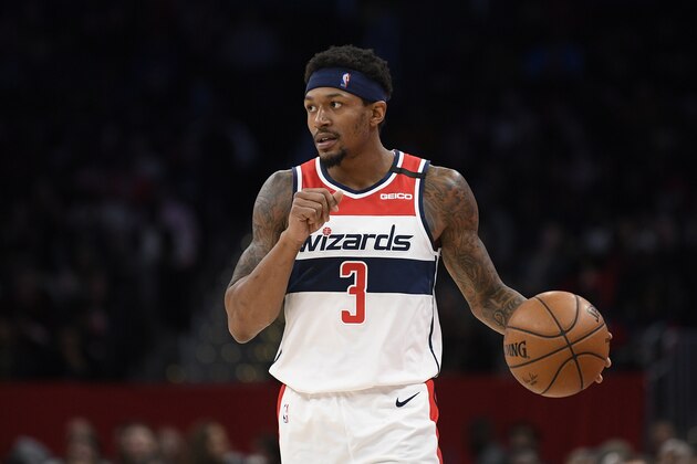 Washington Wizards guard Bradley Beal (3) dribbles the ball during the second half of an NBA basketball game against the Miami Heat, Sunday, March 8, 2020, in Washington. The Heat won 100-89. (AP Photo/Nick Wass)