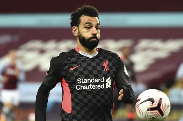 Liverpool's Mohamed Salah during the English Premier League soccer match between Aston Villa and Liverpool at Villa Park in Birmingham, England, Sunday, Oct. 4, 2020. (AP Photo/Rui Vieira)