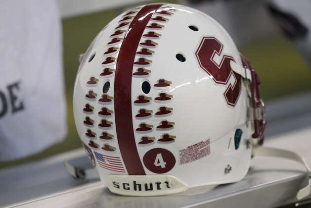 Achievement decals are shown on a Stanford football helmet during a  game between Washington and Stanford, Thursday, Sept. 27, 2012, in Seattle. (AP Photo/Ted S. Warren)