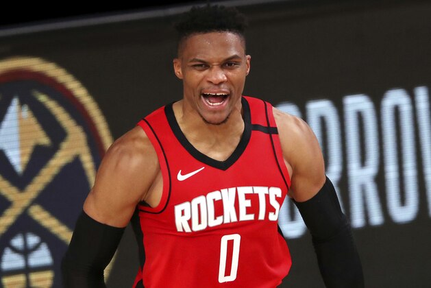 Houston Rockets' Russell Westbrook reacts during the second half of an NBA basketball game against the Dallas Mavericks, Friday, July 31, 2020, in Lake Buena Vista, Fla. (Mike Ehrmann/Pool Photo via AP)