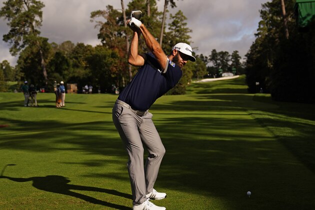 Dustin Johnson tees off on the 18th hole during the first round of the Masters golf tournament Friday, Nov. 13, 2020, in Augusta, Ga. (AP Photo/Matt Slocum)