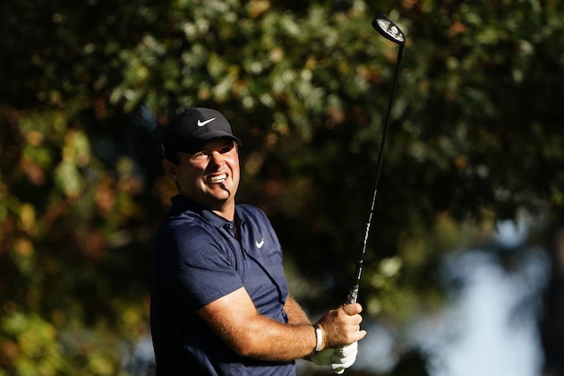 Patrick Reed looks at his shot on the fourth fairway during the second round of the Masters golf tournament Friday, Nov. 13, 2020, in Augusta, Ga. (AP Photo/Matt Slocum)