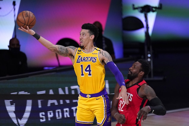 Los Angeles Lakers' Danny Green (14) goes up for a shot as Houston Rockets' Jeff Green (32) defends during the second half of an NBA conference semifinal playoff basketball game Thursday, Sept. 10, 2020, in Lake Buena Vista, Fla. (AP Photo/Mark J. Terrill)
