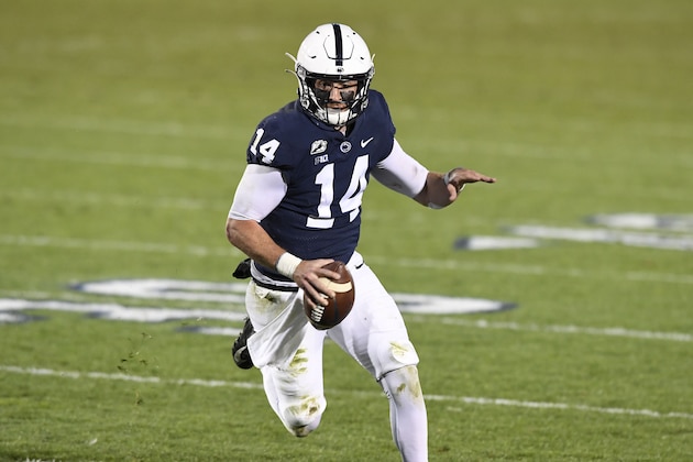 Penn State quarterback Sean Clifford (14) looks for a receiver during an NCAA college football game against Ohio State in State College, Pa., on Saturday, Oct. 31, 2020. Ohio State defeated Penn State 38-25. (AP Photo/Barry Reeger)